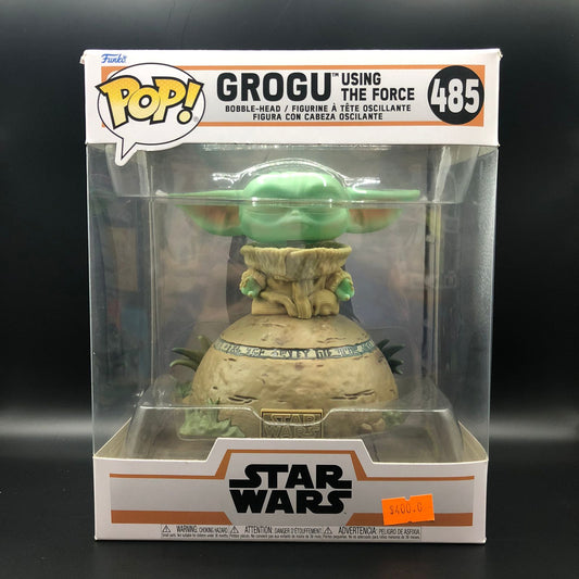 Funko Pop Deluxe de Grogu de la serie "The Mandalorian" de Star Wars.#485